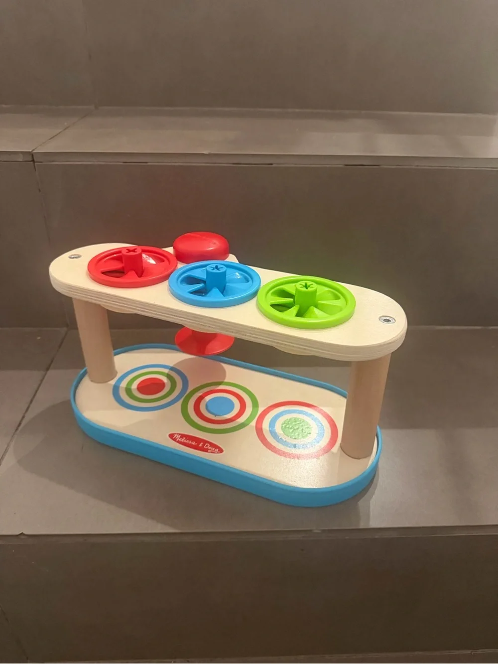 Melissa & Doug Wooden Spinner with Red, Blue & Green Spinning Tops - Picture 2 of 2